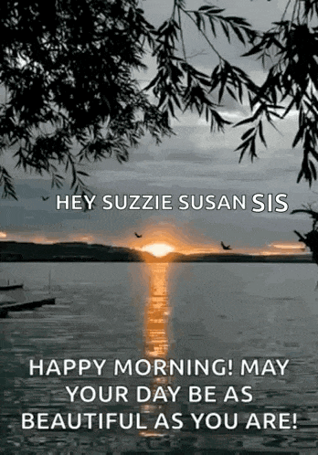 a happy morning greeting card with a sunset over a body of water .