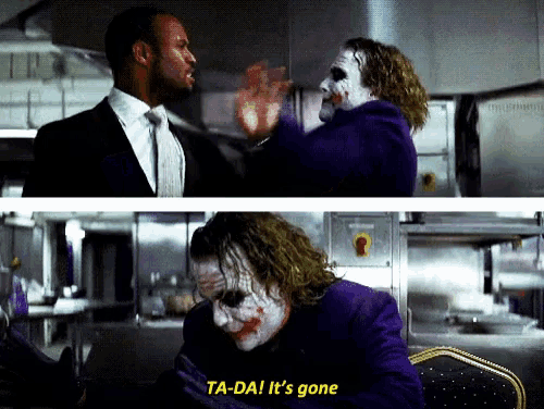 a joker says ta-da it 's gone while talking to a man in a suit