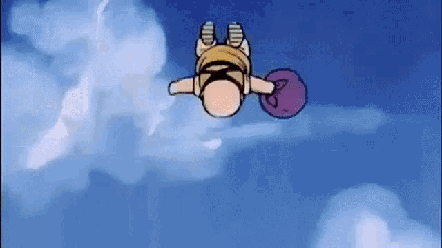 a cartoon character is flying through the air holding a purple ball .