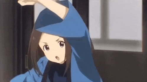 a girl in a blue jacket is standing in front of a window and stretching her arms .