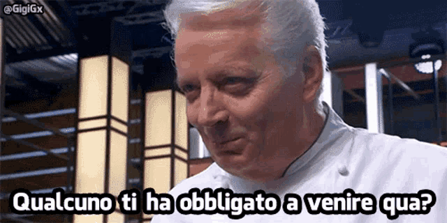 a man in a chef 's uniform says qualcuno ti ha obbligatorio a venire qua