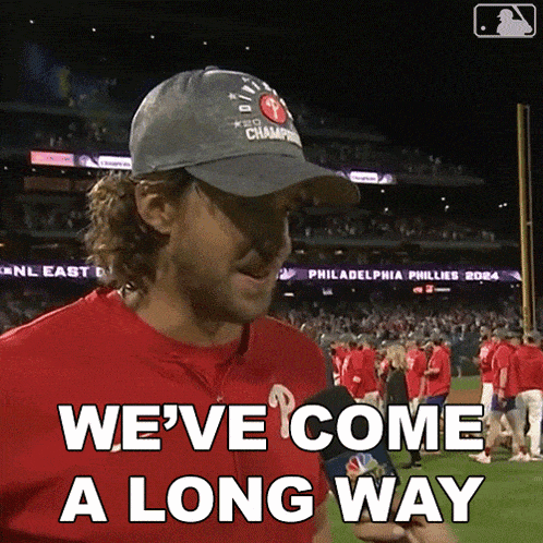 a man wearing a hat that says philadelphia phillies 2014 on it