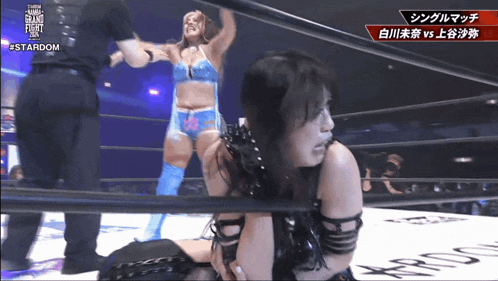 a woman in a wrestling ring with #stardom written on the bottom