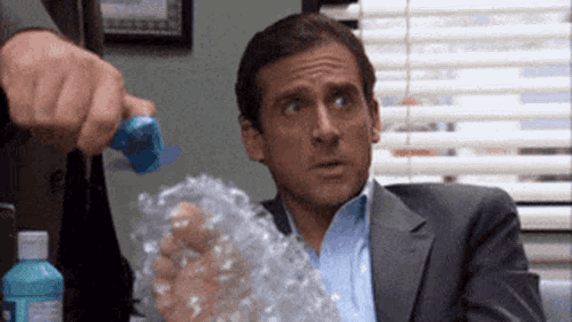 The Office Bubble Wrap GIF - The Office Bubble Wrap Michael Scott GIFs