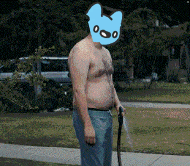 a man without a shirt is holding a cane with a blue bear on his head
