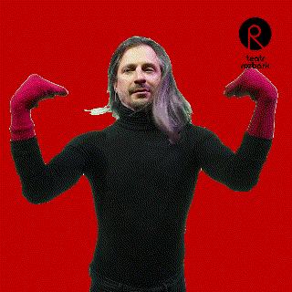 a man wearing a black turtleneck and pink gloves stands in front of a red background with the letter r on it