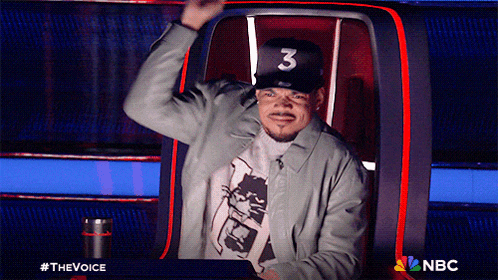 a man wearing a hat with the number three on it