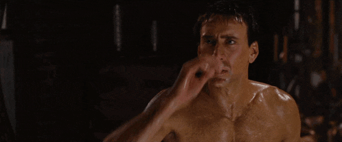 a shirtless man wipes his forehead with the words wel come to minn max