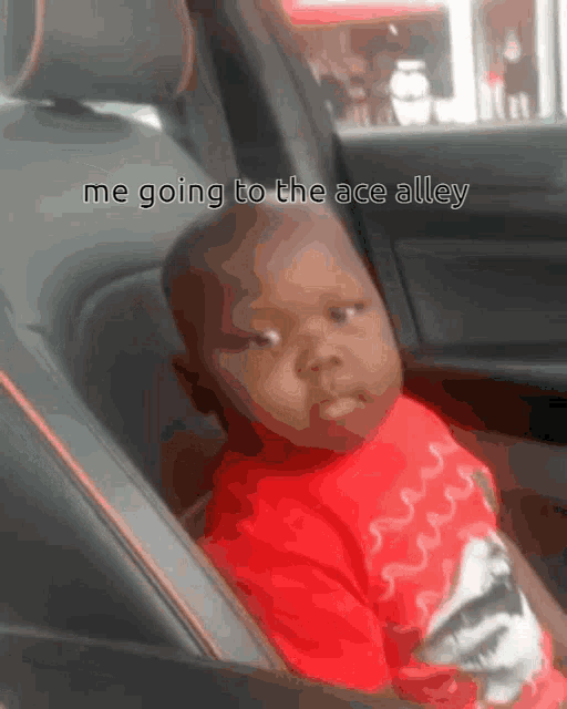 a baby is sitting in the back seat of a car with the words me going to the ace alley below him