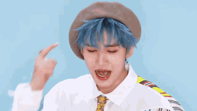 a young man with blue hair wearing a hat and a tie