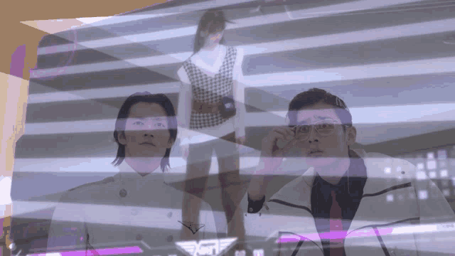 a man and a woman are standing in front of a screen that says ' a ' on it