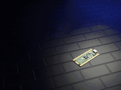 a small electronic device is laying on a black tile floor