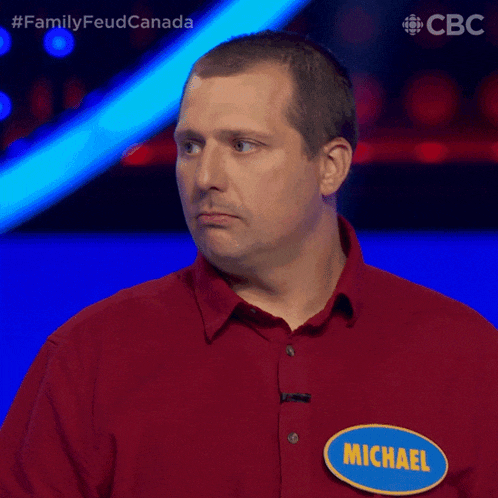 a man in a red shirt with the name michael on the back