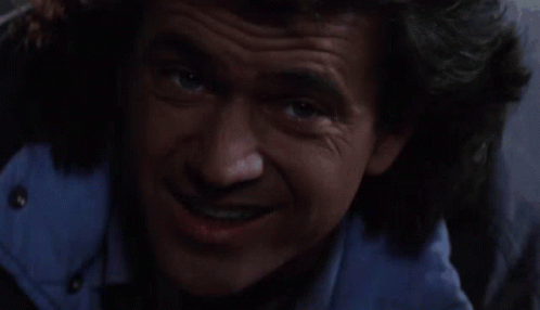 Martin Riggs Eats Dog Biscuits GIF - Martin Riggs Eats Dog Biscuits GIFs