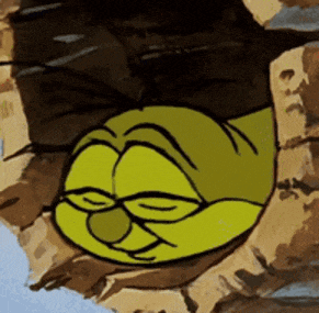 a cartoon character sleeping in a hole in a rock