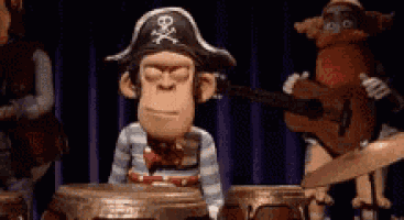 a monkey in a pirate hat is playing a guitar