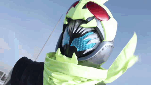 a person wearing a helmet with a yellow scarf around their face