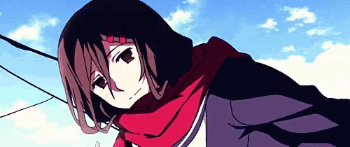 the girl is wearing a red scarf around her neck and a hood .