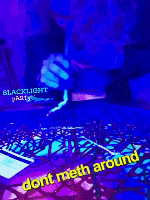 a poster for a blacklight party with a person smoking