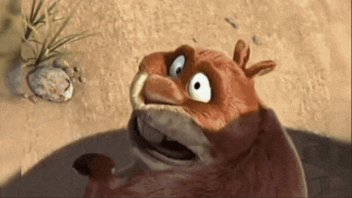 a close up of a cartoon character with a surprised look on its face