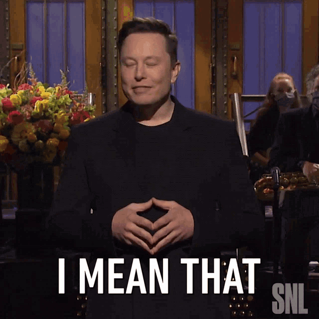elon musk says i mean that snl in front of flowers
