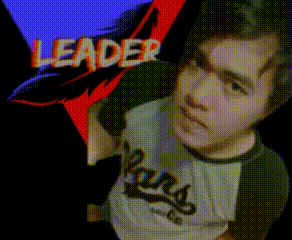 a man wearing a shirt that says ' leaders ' on it
