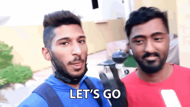 two men are standing next to each other with the words let 's go written on their faces