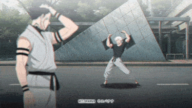 a man in a black belt is standing next to another man in a white shirt with the words nes banana on the bottom