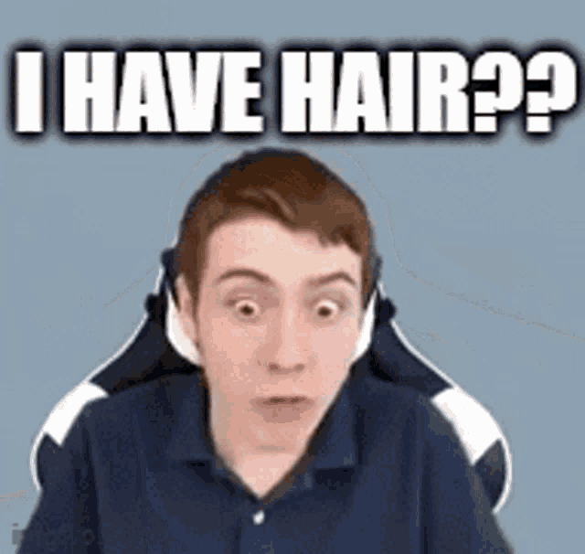 a young man is sitting in a gaming chair and making a funny face while asking if he has hair .