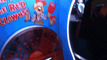 a blue sign with a clown on it that says " all red clowns "