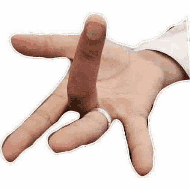 a close up of a person 's hand with a ring on it .
