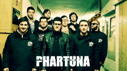 a group of men standing in a hallway with the word phartuna on the bottom right