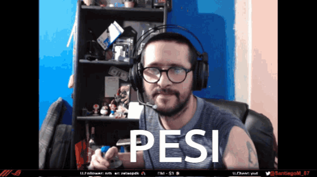 a man wearing glasses and headphones says " pes " on the screen