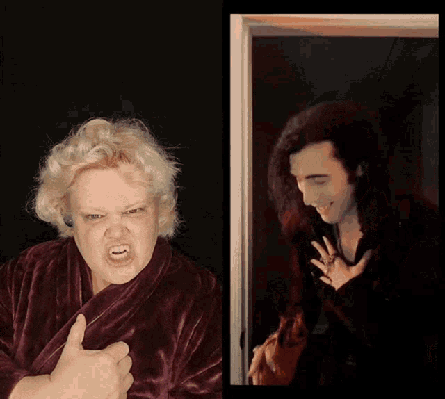 a woman in a robe is giving a thumbs up next to a man with long black hair
