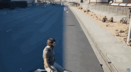 a man is kneeling down on the side of a road with a twitch icon on the right side