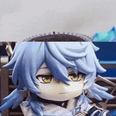 a close up of a figurine with blue hair