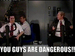 two men sitting on a plane with the words " you guys are dangerous " on the bottom