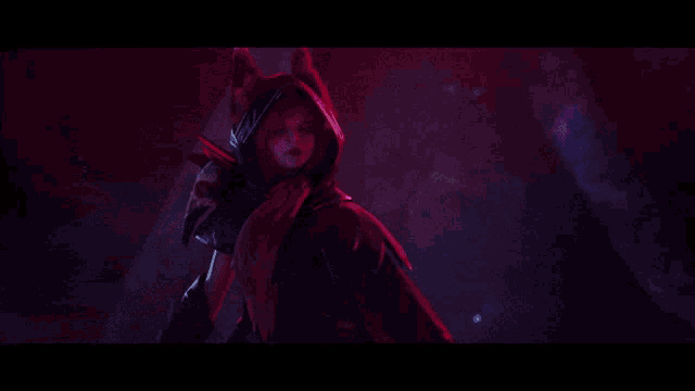 a woman in a hooded cape is holding a pair of purple claws