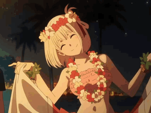 a girl in a bikini with a lei around her neck is smiling