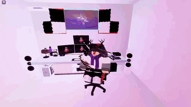 a girl in a purple scarf is sitting in front of a computer