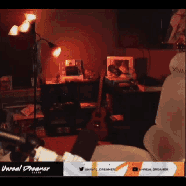 a screen shot of a room with the words unreal dreamer on the bottom