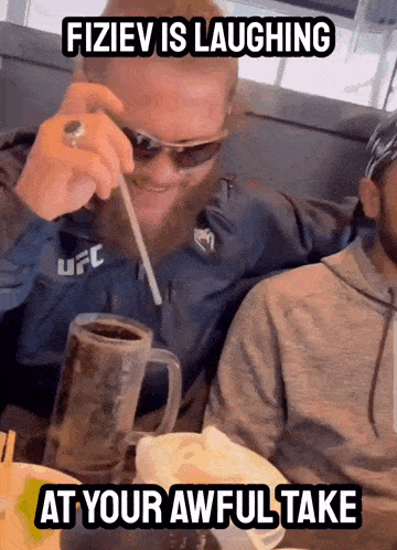 a man drinking through a straw with the caption " fiziev is laughing at your awful take "