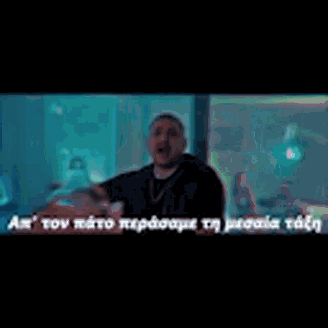 a man is making a funny face in a video with the words gordon ramsay written on it .