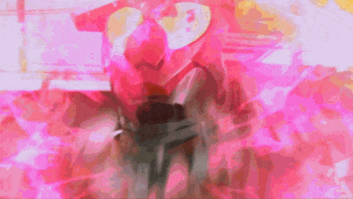 a blurred image of a person in a pink outfit