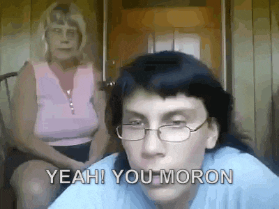 a woman wearing glasses says yeah you moron in front of another woman .