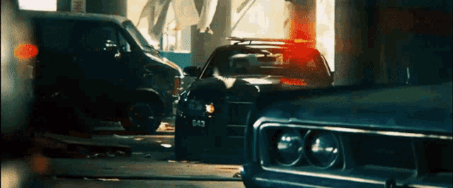 a black car with the license plate number 543