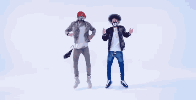 two men wearing face masks are standing next to each other on a white background .