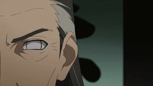 a close up of a man 's face with gray hair and white eyes