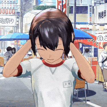 a girl in a white shirt has a name tag that says ' 大 徳 ' on it