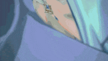a blue circle on a white surface with a blurred background